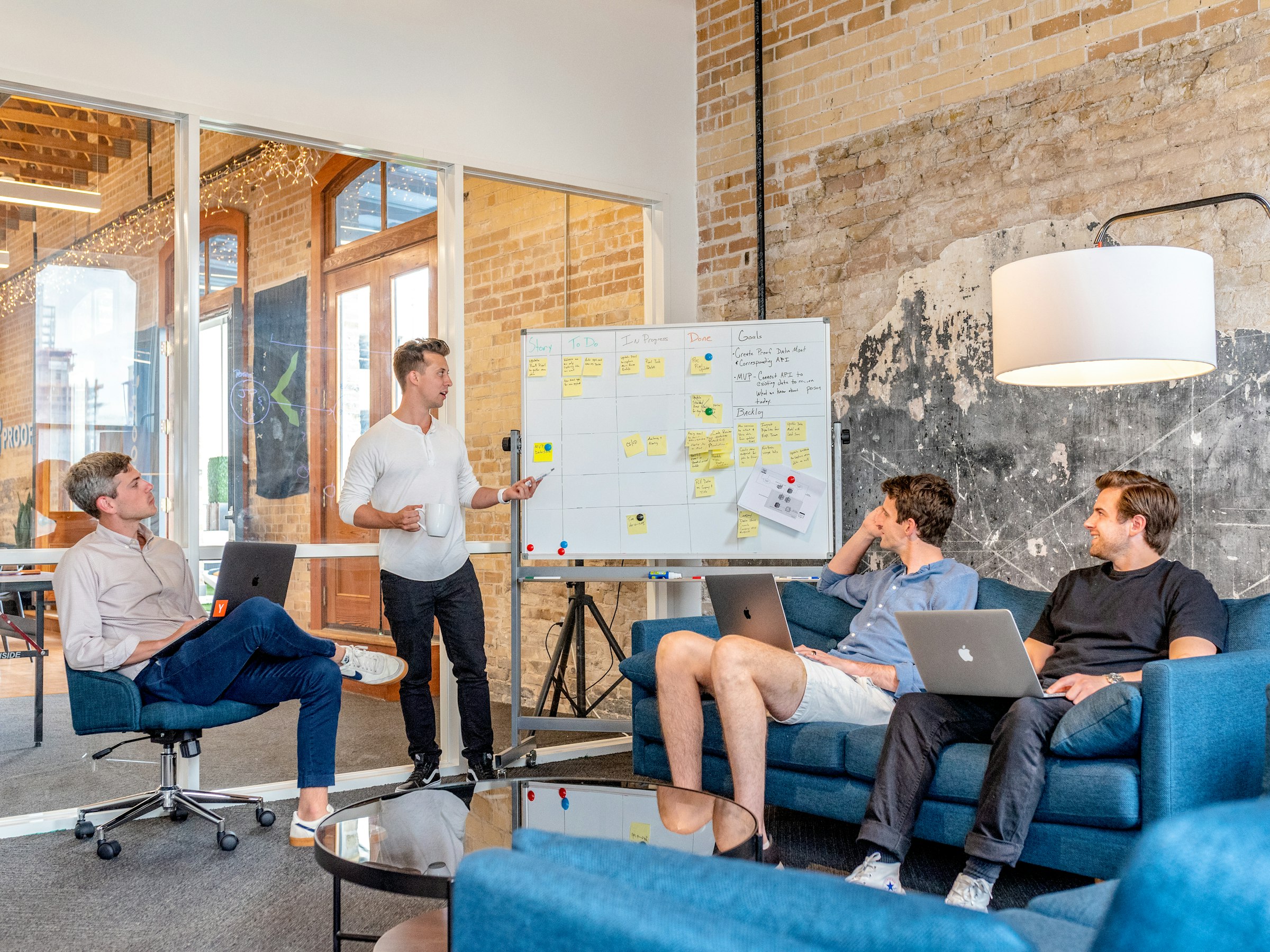 Consultants running a workshop with a client team